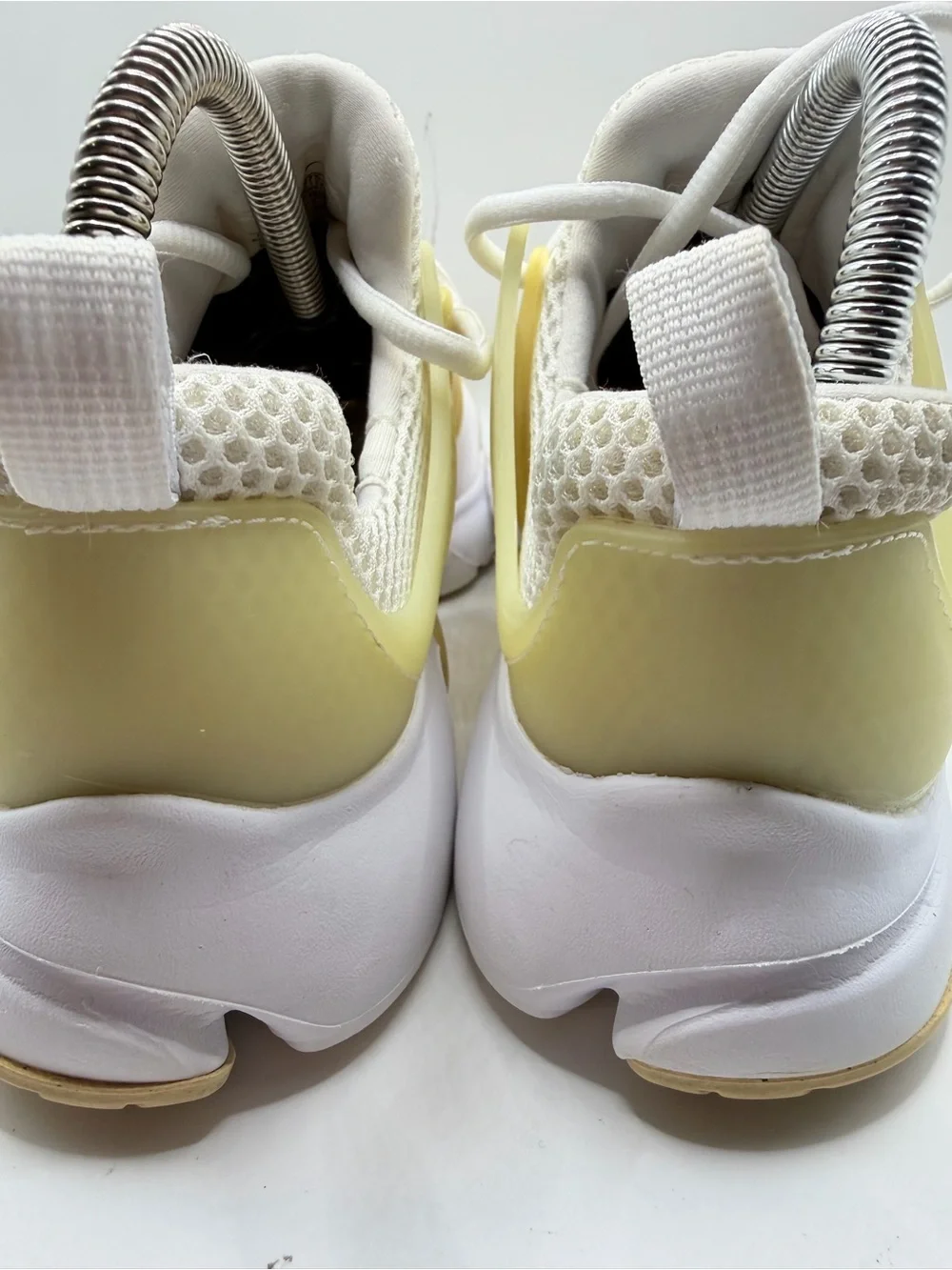Nike Women's Pale Yellow and White Slip-On Athletic Sneakers